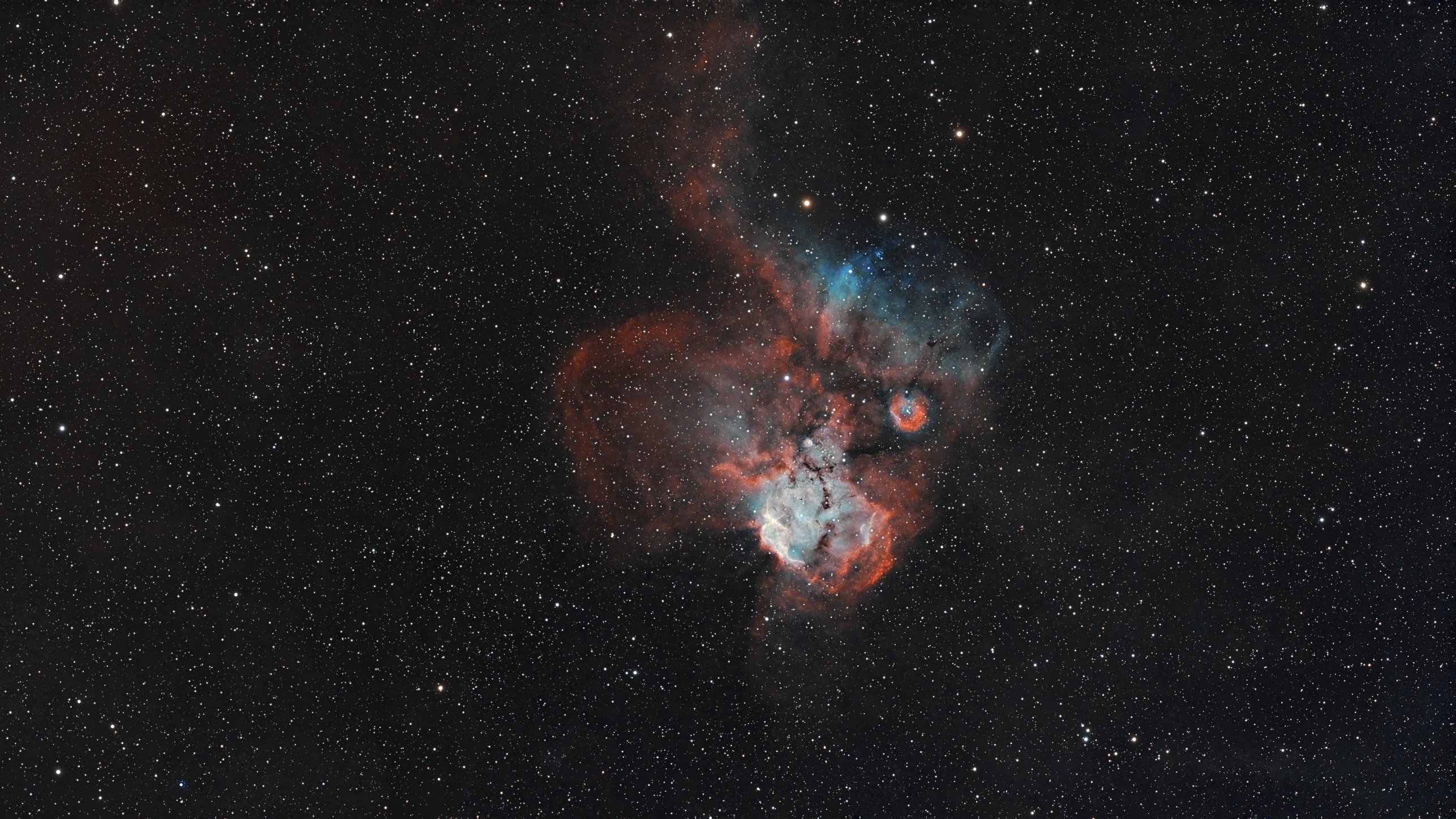 NGC 2467 Nébuleuse de la tête de mort et des tibias, 33×300s - Askar 71F et ASI585MC